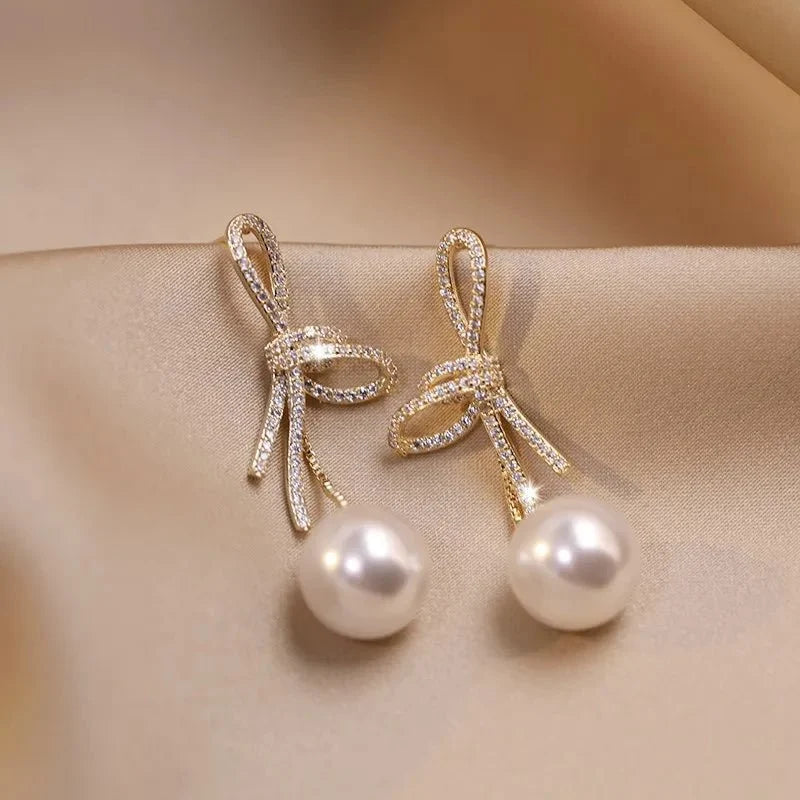 Dazzling Bowknot Pearl Drop Earrings - Veinci