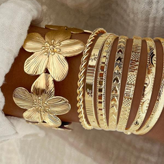 8-Piece Floral Accented Adjustable Textured Cuff Stack